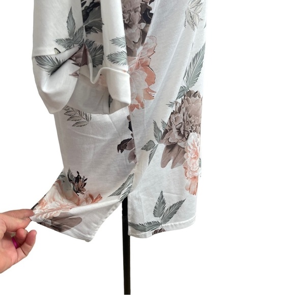 Boutique Floral V Neck Tee with Rolled Sleeves and a Longer Loose Fit - Picture 11 of 14